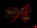 A wallpaper of the GGXXAC logo on a black background.