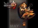 A wallpaper of May on a grey and black background with the GG Isuka logo.